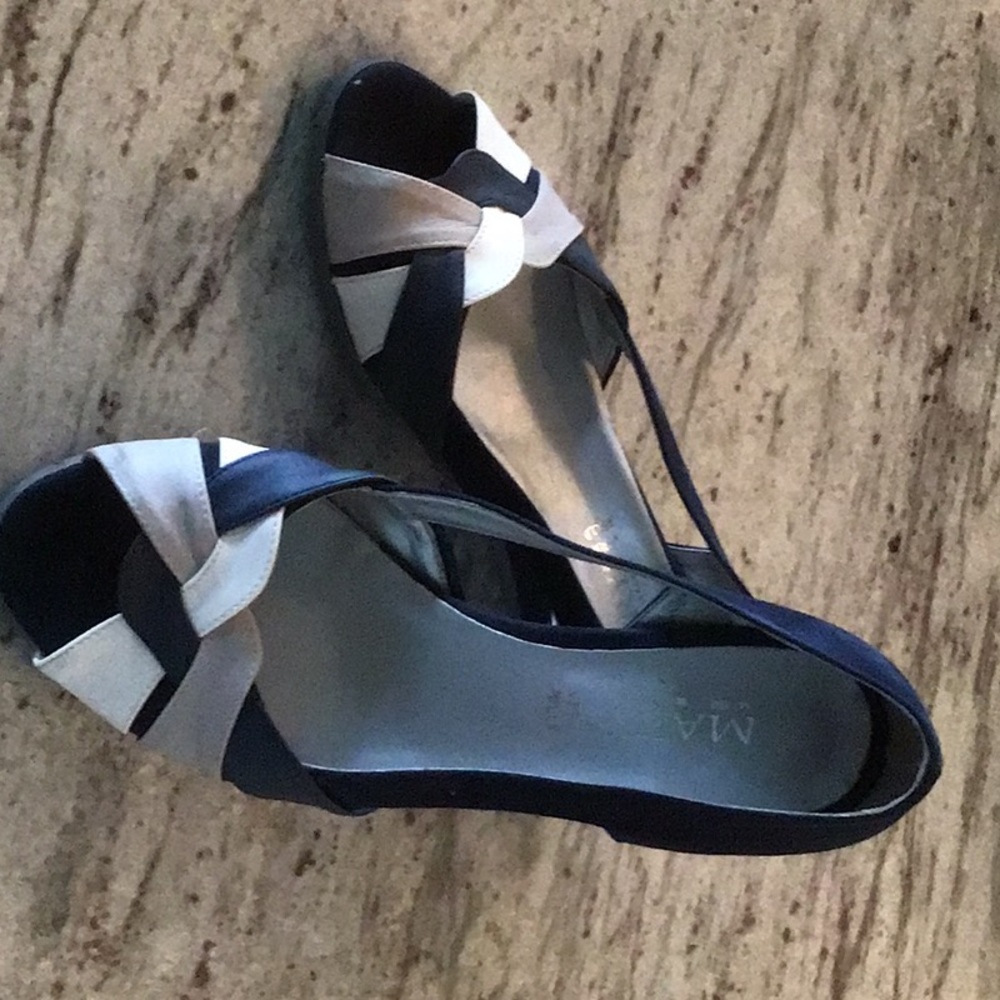 Made in Italy open toe wedge shoes.